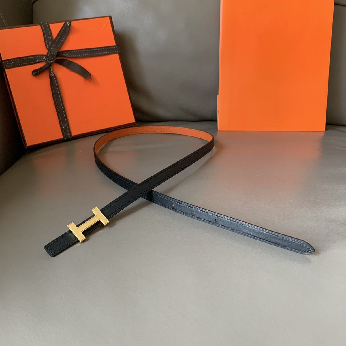 FOCUS BELT GOLD BUCKLE ORANGE AND BLACK REVERSIBLE LEATHER 1.3CM.