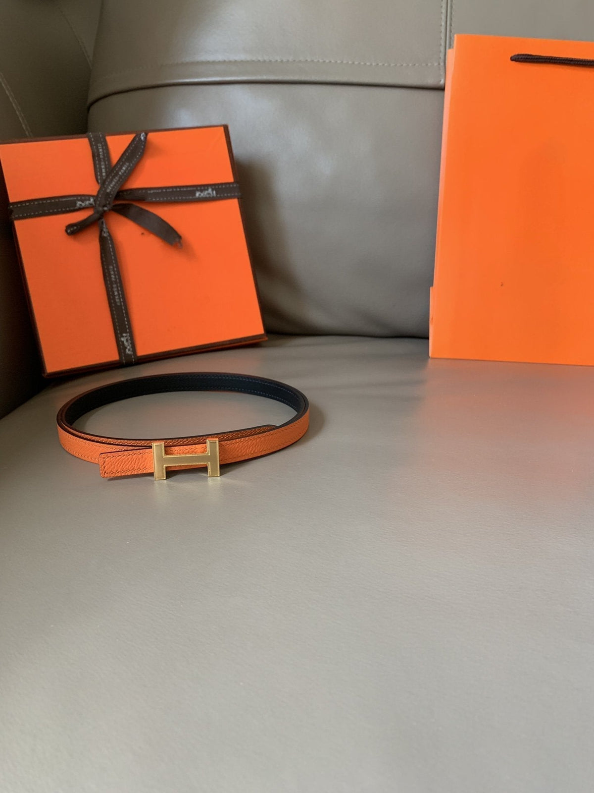 FOCUS BELT GOLD BUCKLE ORANGE AND BLACK REVERSIBLE LEATHER 1.3CM.