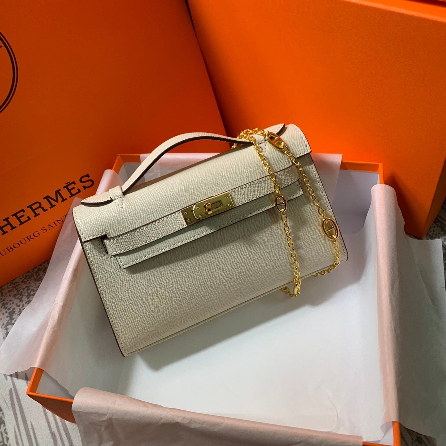 HM KELLY MINI POCHETTE 22 CREAM EPSOM