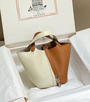 picotin lock 18 gold white togo shw