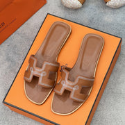 0ran sandal brown white epsom