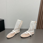 ALAIA SHORT BOOTS IN WHITE MESH FISHNET