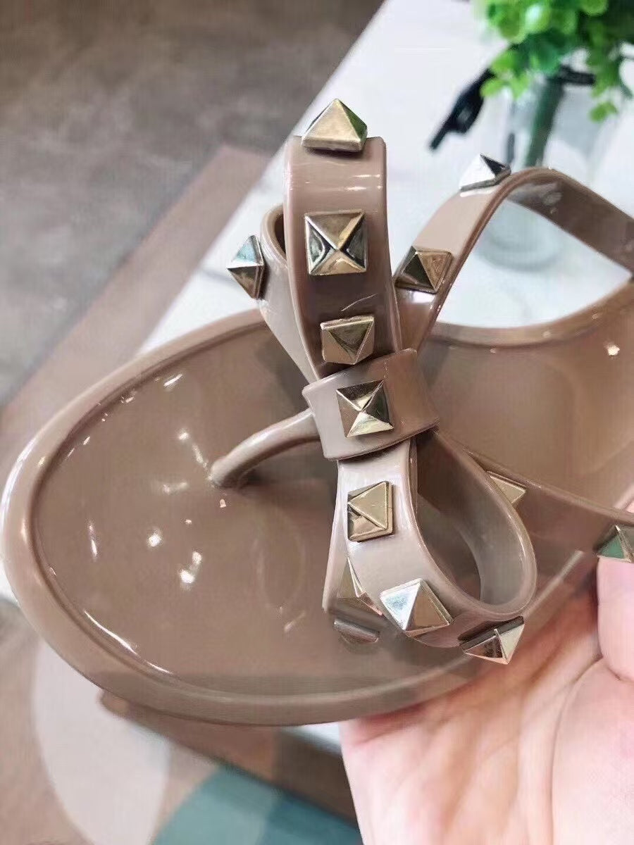 Valentino Garavani 2026 PVC Jelly Rockstud Bow Beige Thong Sandals
