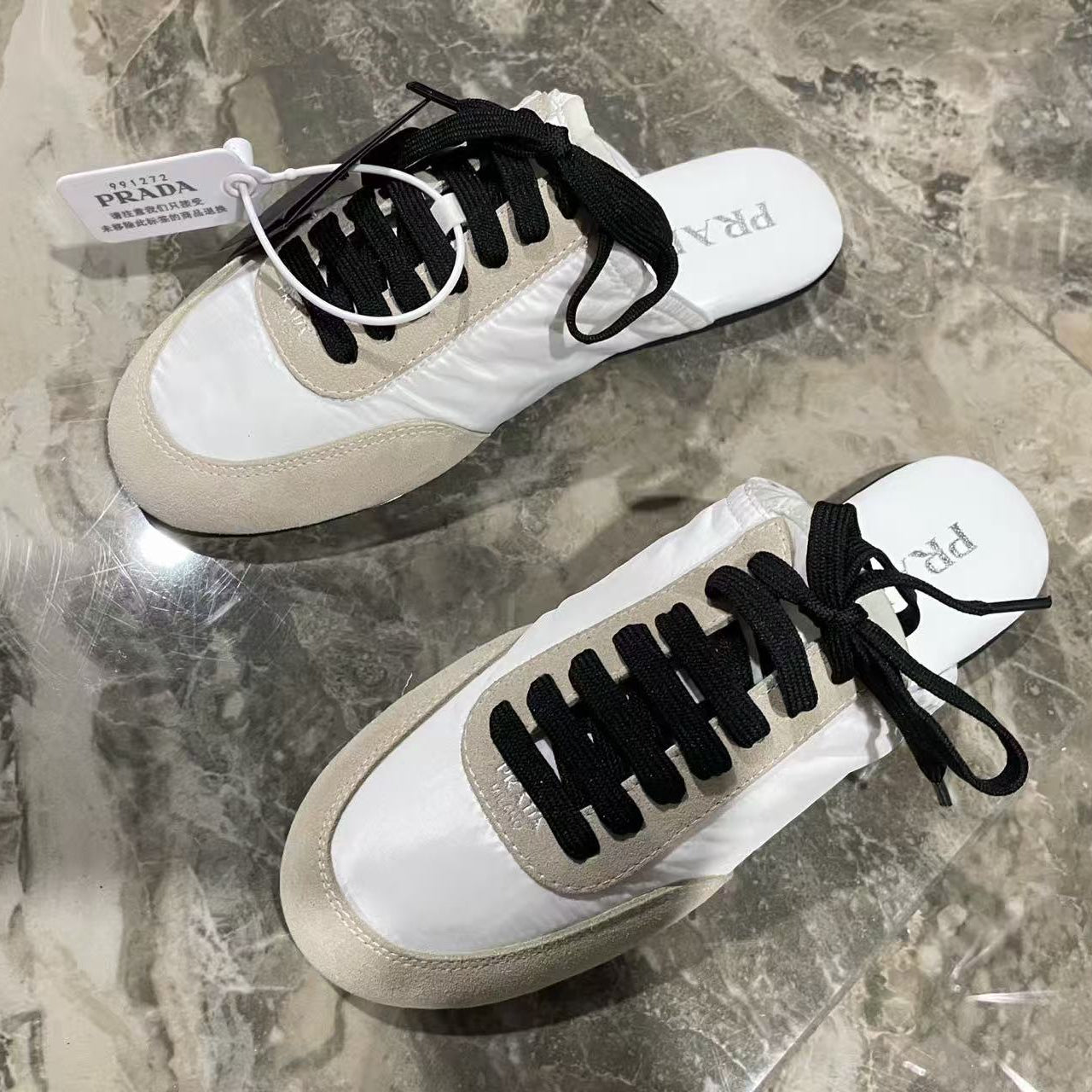 Prada 2026 Collapse Re-Nylon Mule White Black Suede