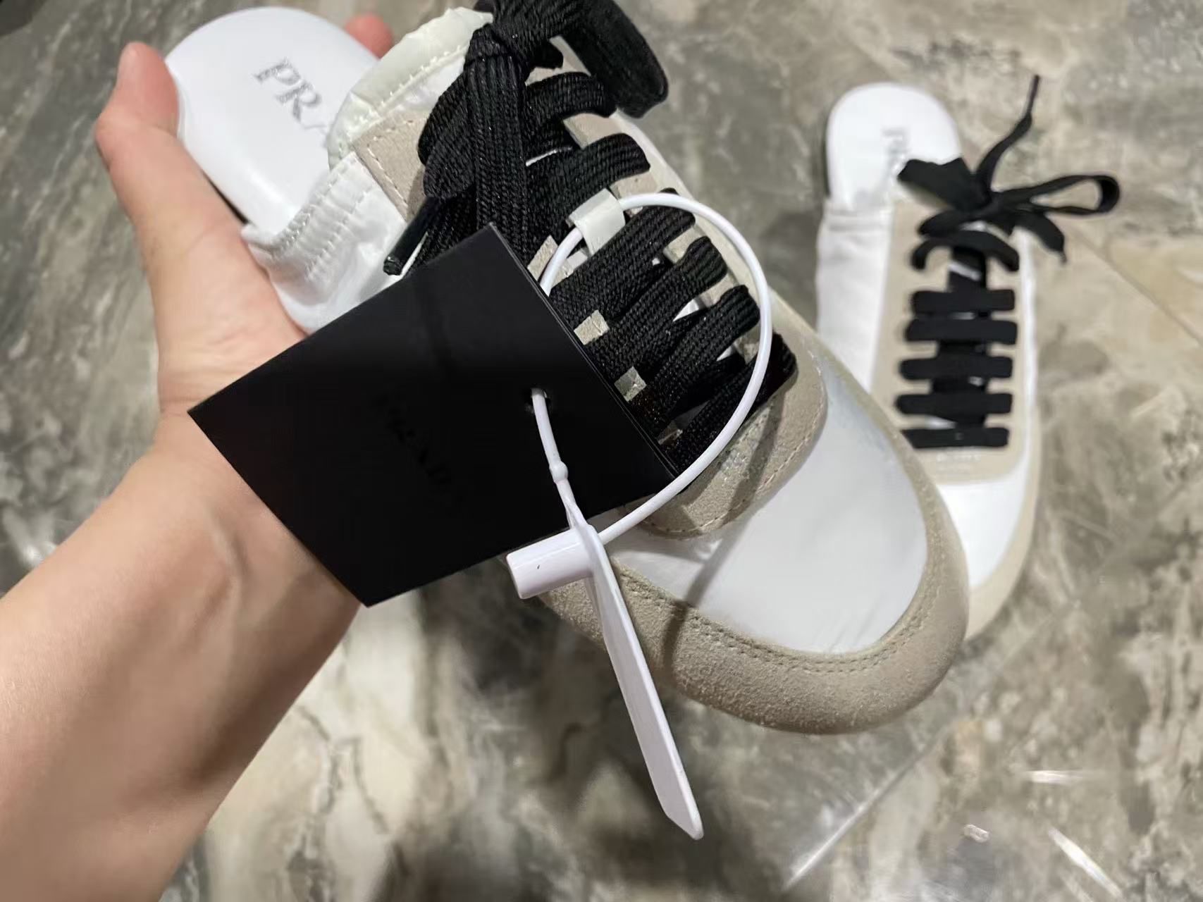 Prada 2026 Collapse Re-Nylon Mule White Black Suede