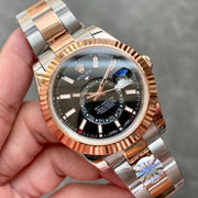 SKY-DWELLER TWO-TONE 42 ROSE GOLD BEZEL BLACK DIAL