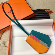 HM Clochette Cles Grand Tressage Charm In Yellow And Turquoise