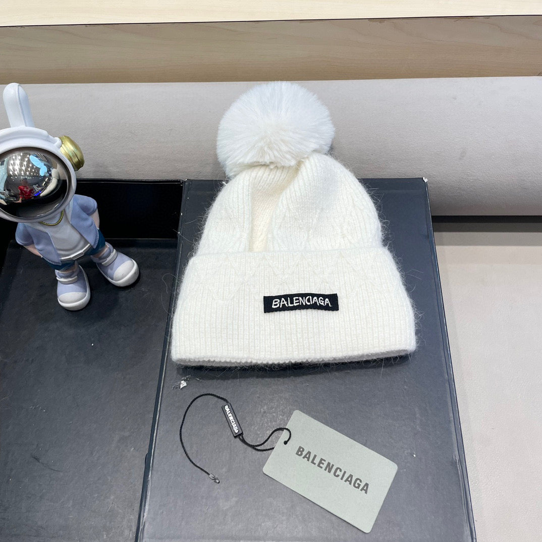 Balenciaga Knitted Hat with Pom-Pom 436967