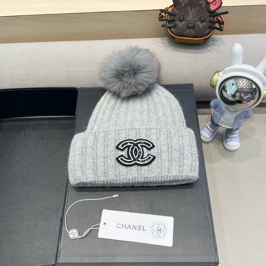 Chanel Knitted Hat With Pom-pom 437120