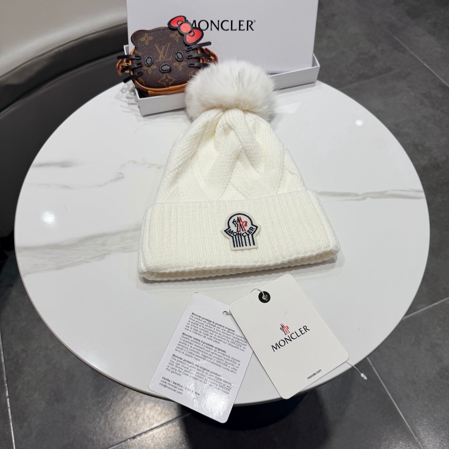 Moncler Wool Hat With Pom-pom 435188