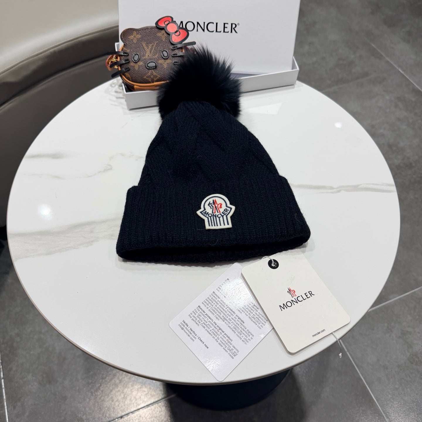 Moncler Wool Hat With Pom-pom 435188
