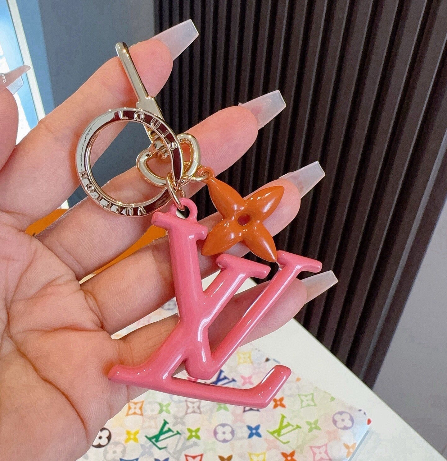 LV Logo Charm 415613