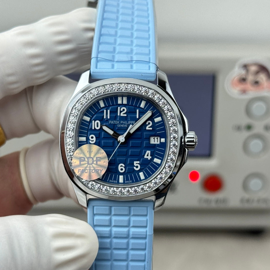 Patek Philippe Aquanaut 35.6mm Navy Blue Dial Blue Rubber Strap