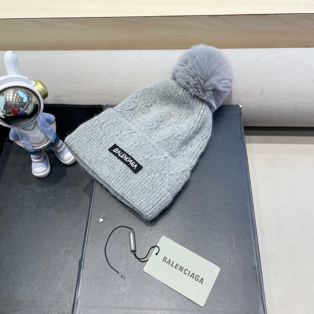 Balenciaga Knitted Hat with Pom-Pom 436967