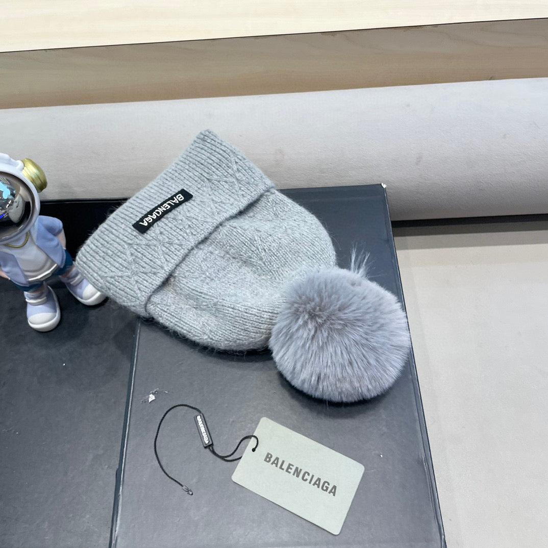 Balenciaga Knitted Hat with Pom-Pom 436967