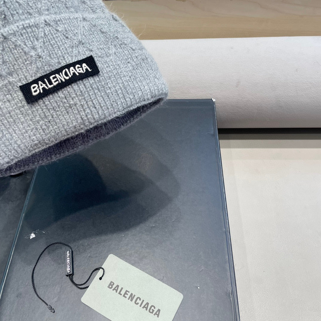 Balenciaga Knitted Hat with Pom-Pom 436967