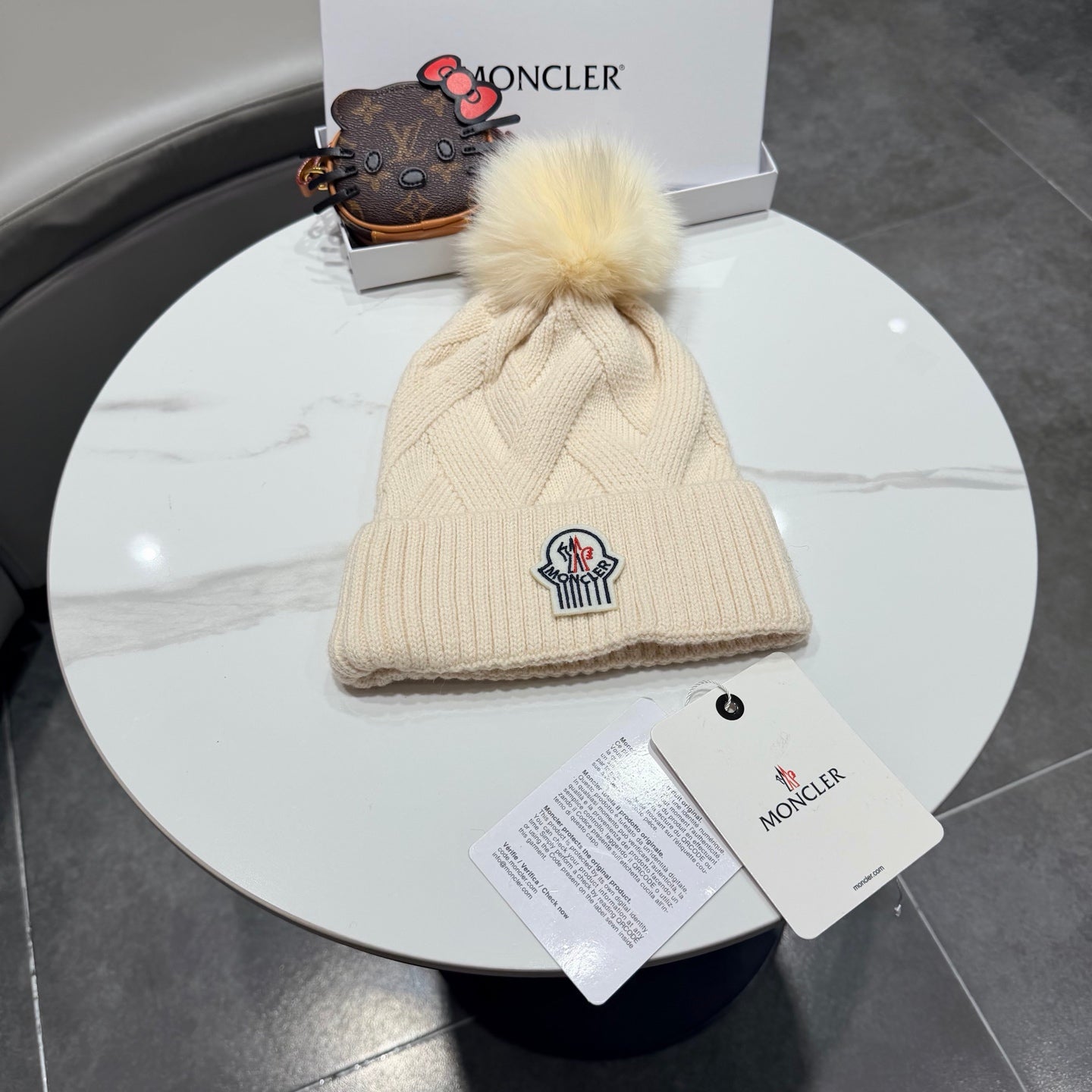 Moncler Wool Hat With Pom-pom 435188