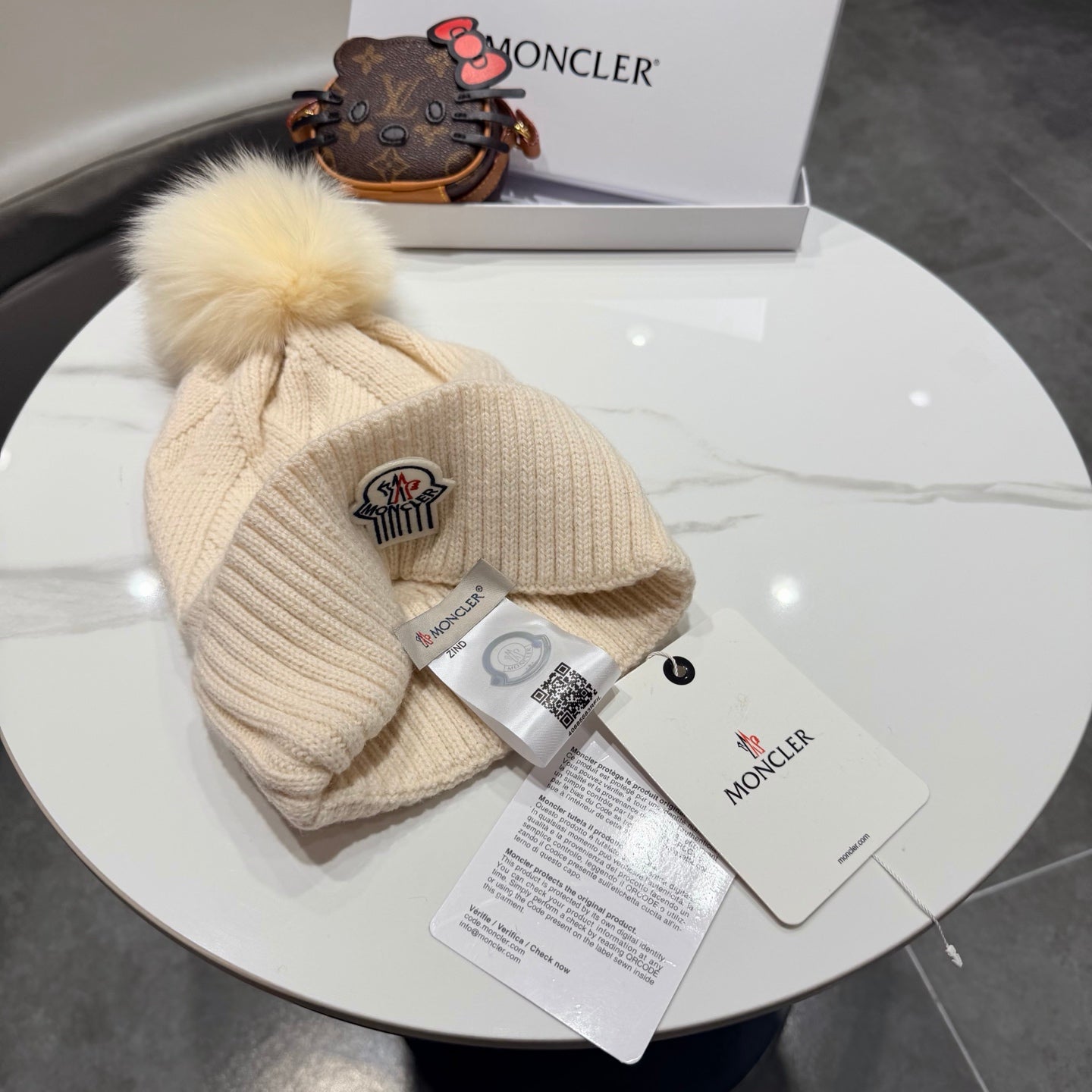 Moncler Wool Hat With Pom-pom 435188