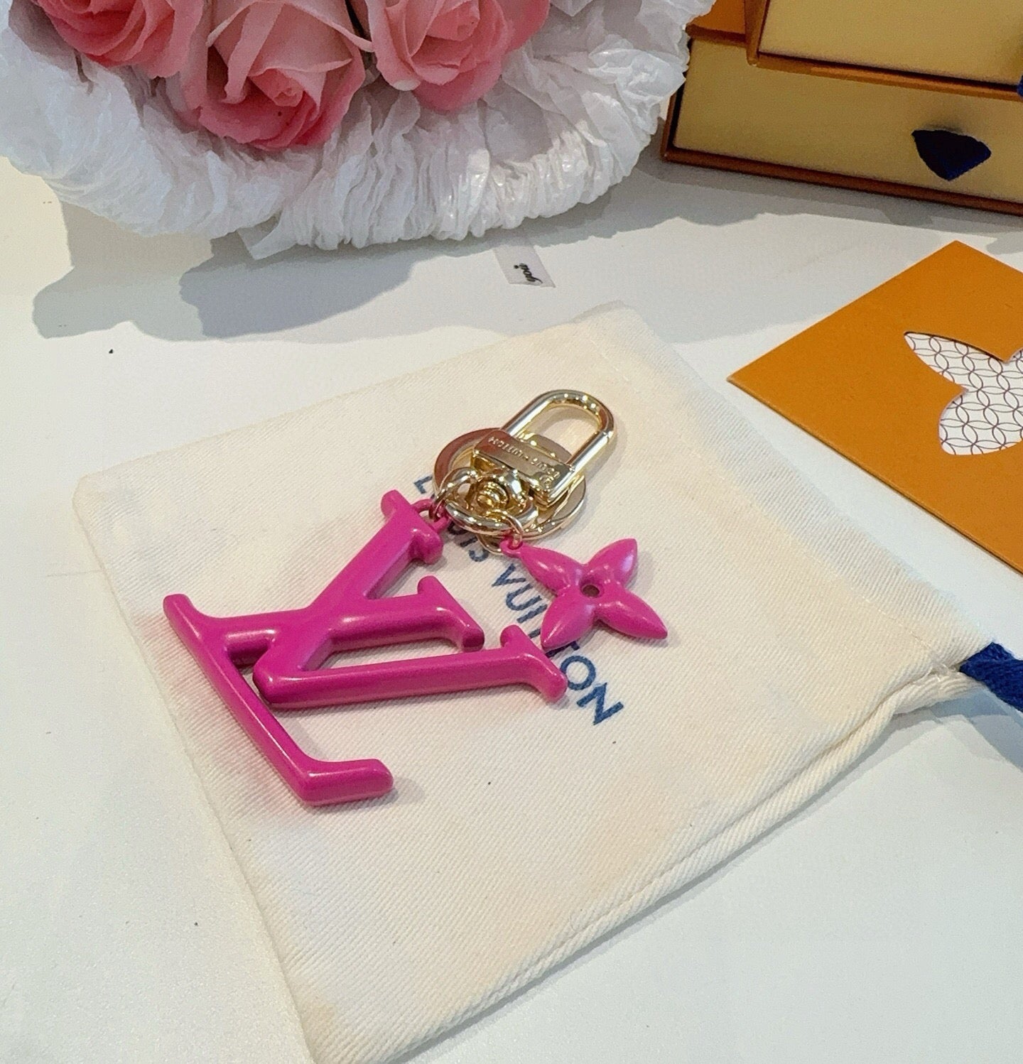 LV Logo Charm 415613