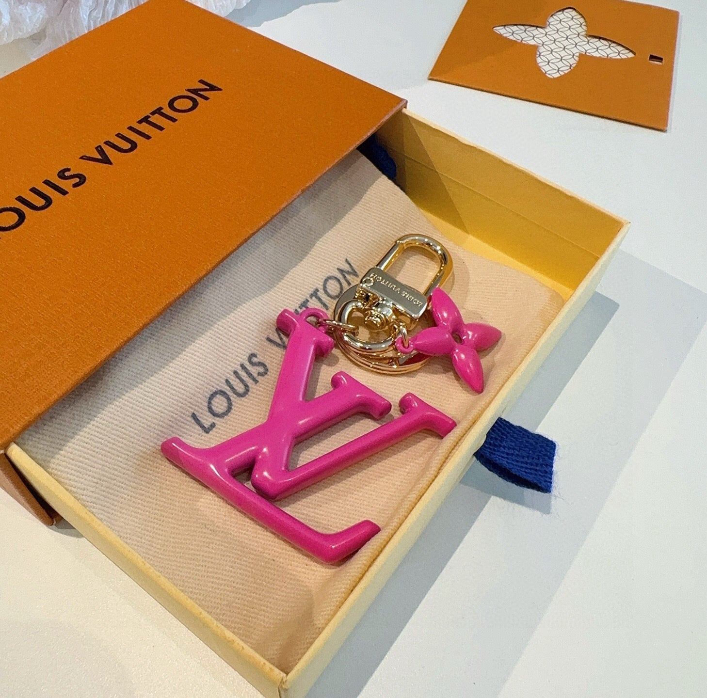LV Logo Charm 415613