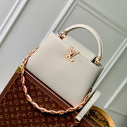 capucines mm 31.5 rock grey taurillon leather gold hardware