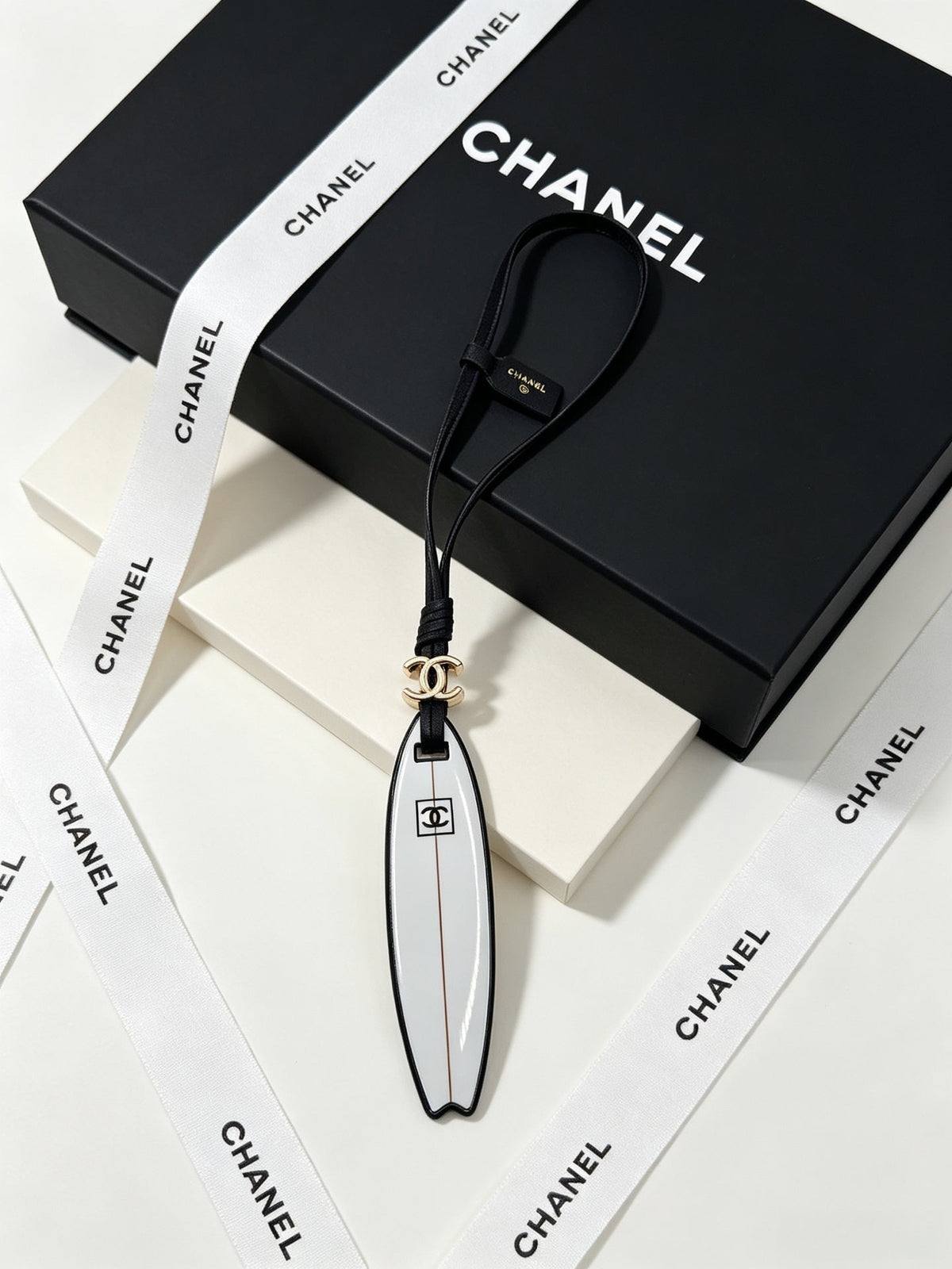 Chanel Surfboard-shaped Leather Cord Charm