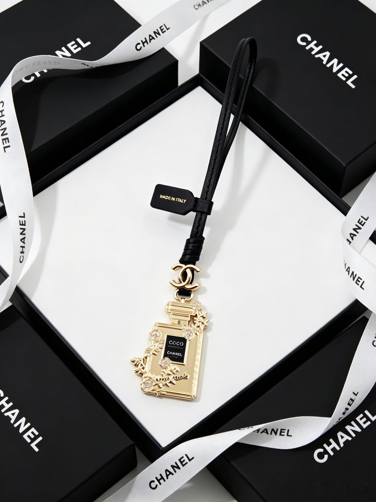 Chanel Perfume Bottle-shaped Leather Cord Charm