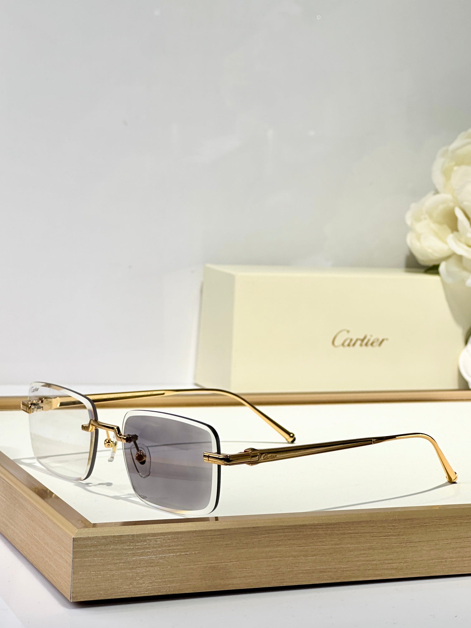 C DE RIMLESS SQUARE FRAME SUNGLASSES CT0610S IN METAL