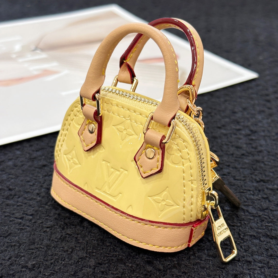 LV Alma Bag Charm Yellow mix Beige Cowhide Canvas