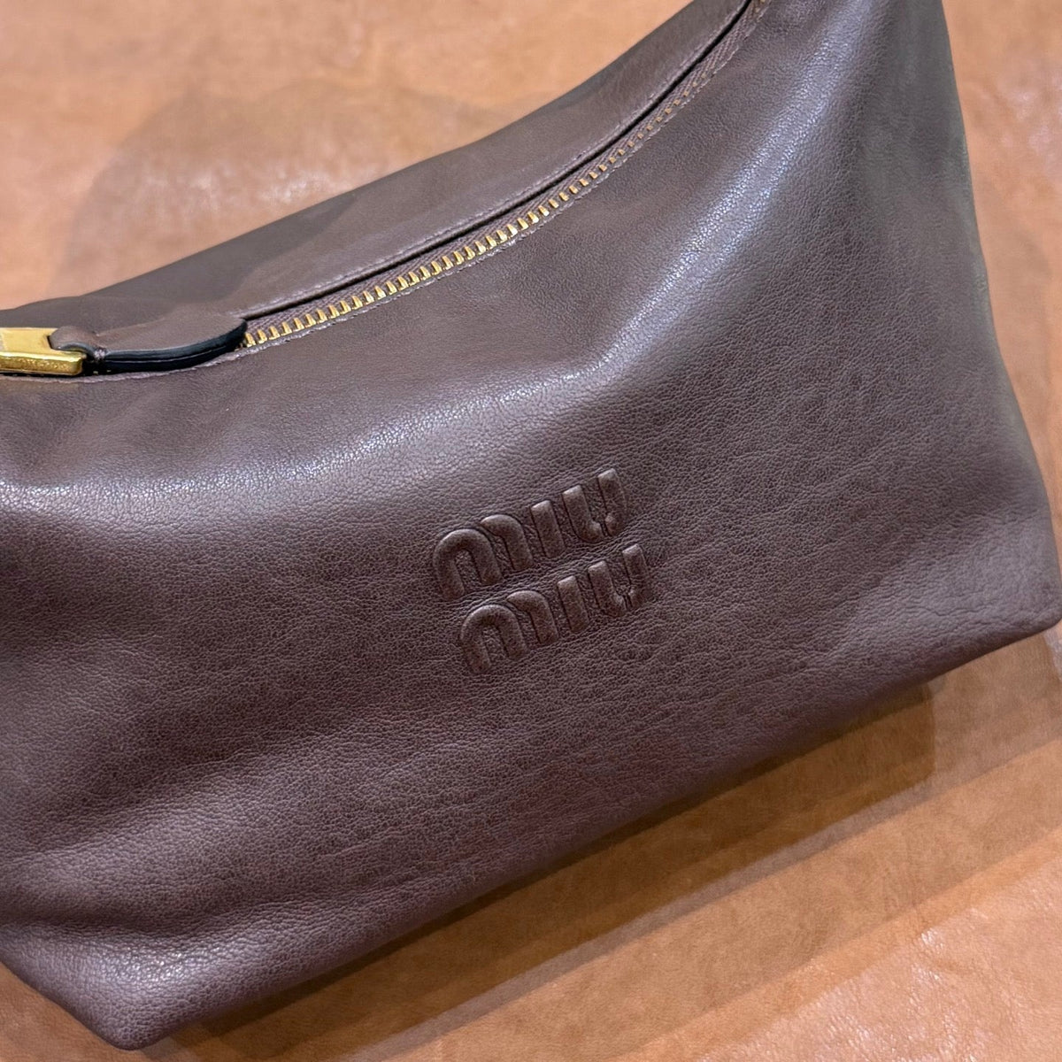 MiuMiu 2026 Spirit Pouch Bag 19cm Dark Brown Nappa Leather