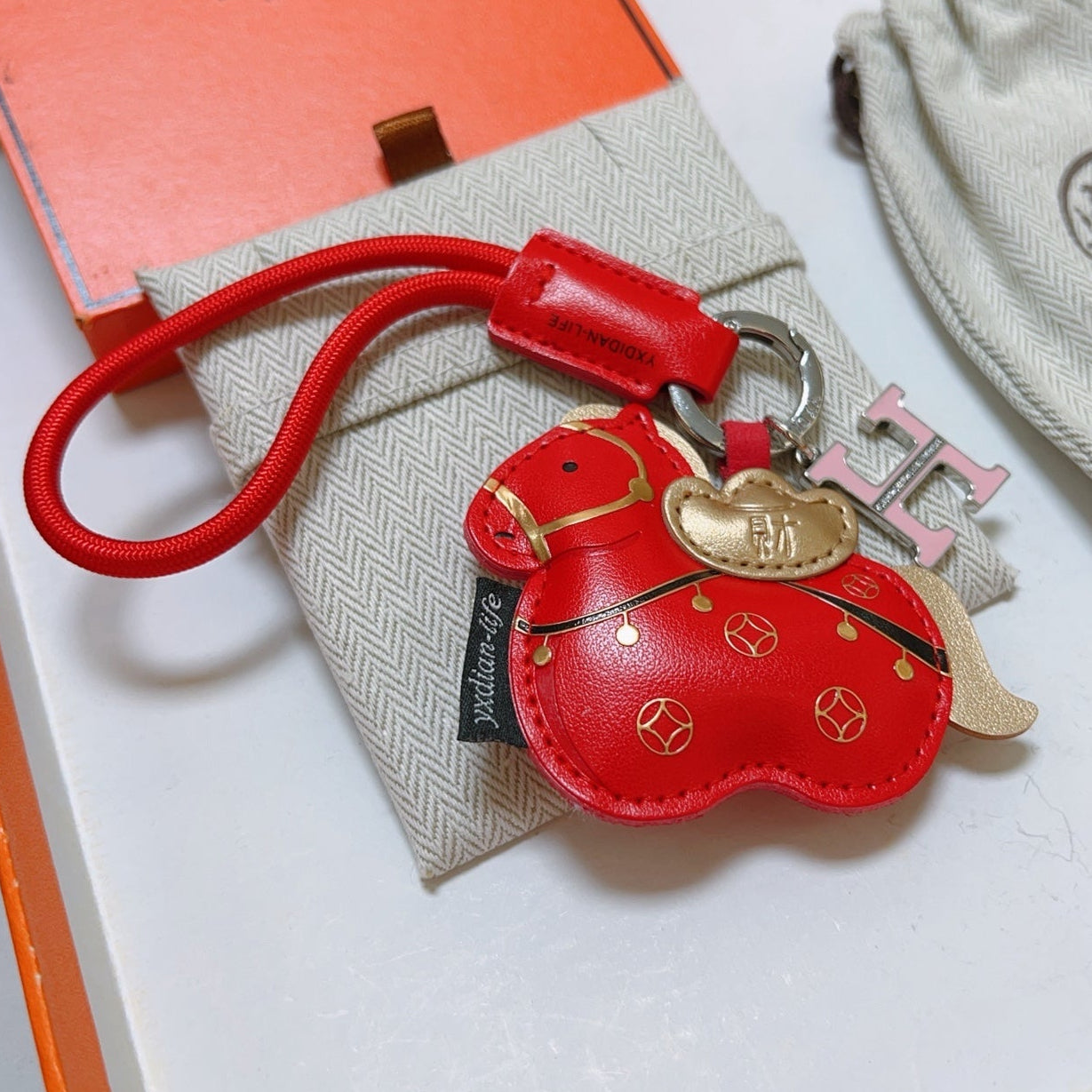 HM Red Horse Charm With An H-shaped Keyring