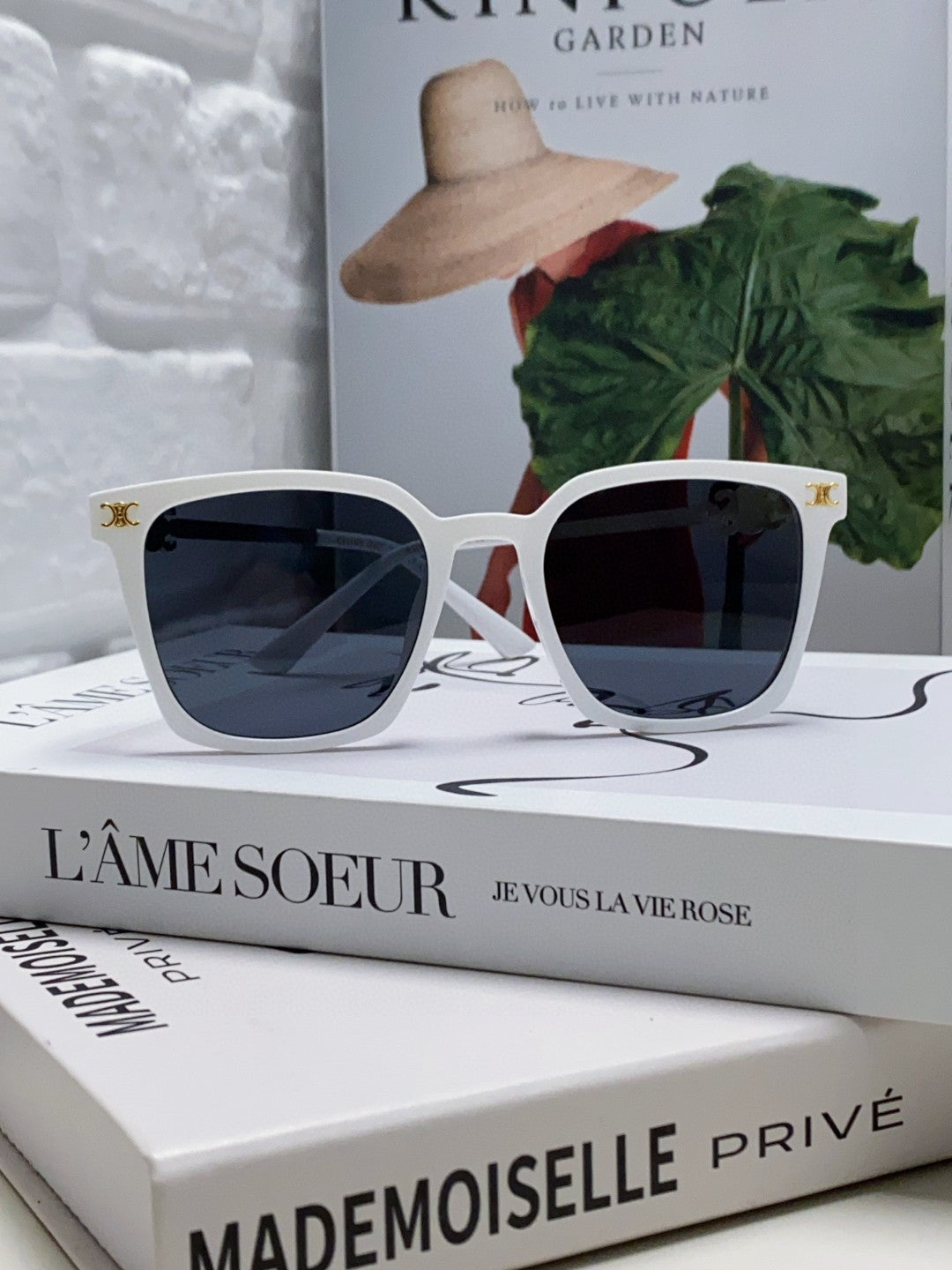 TRIOMPHE SUNGLASS 497817 IN WHITE METAL BLACK LENSES