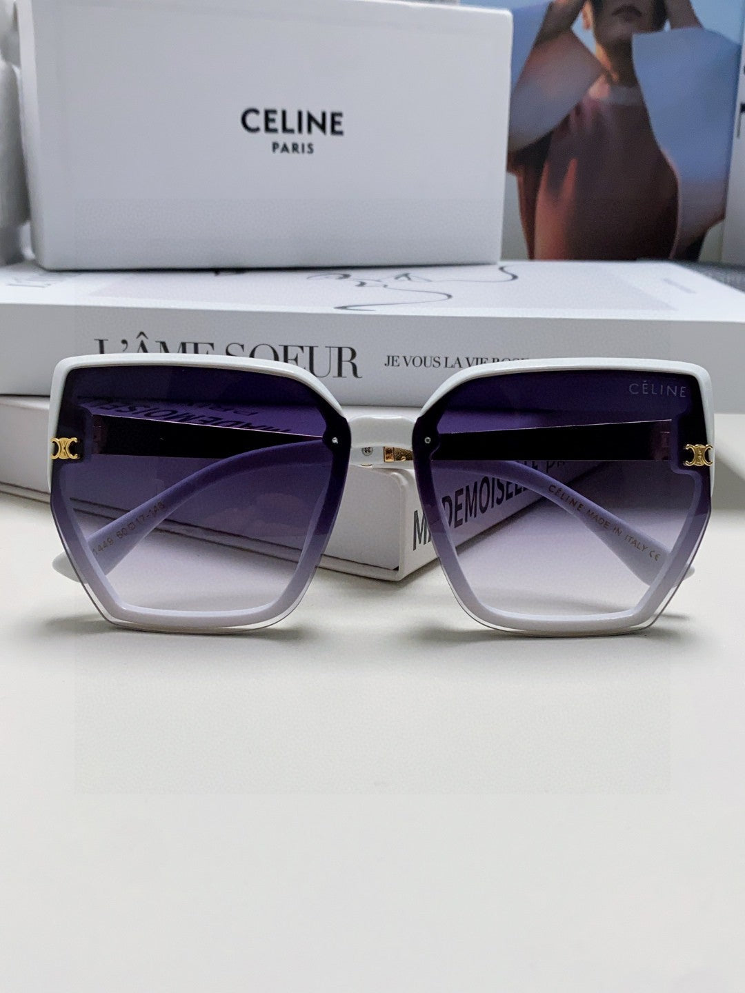 TRIOMPHE SUNGLASS 497829 IN WHITE ACETATE EMBOSSED LOGO