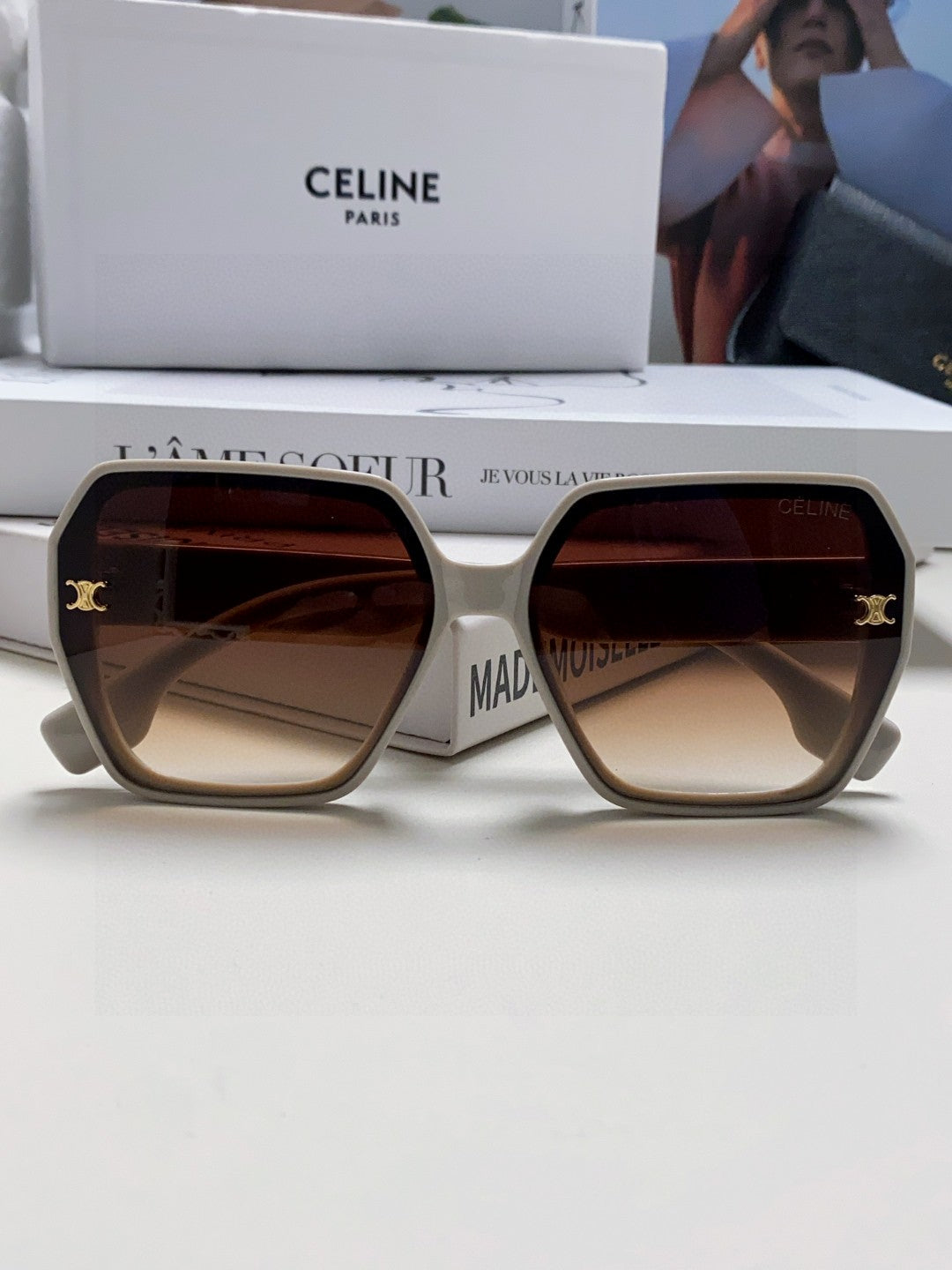 TRIOMPHE SUNGLASSES 552770 IN LIGHT GREY ACETATE