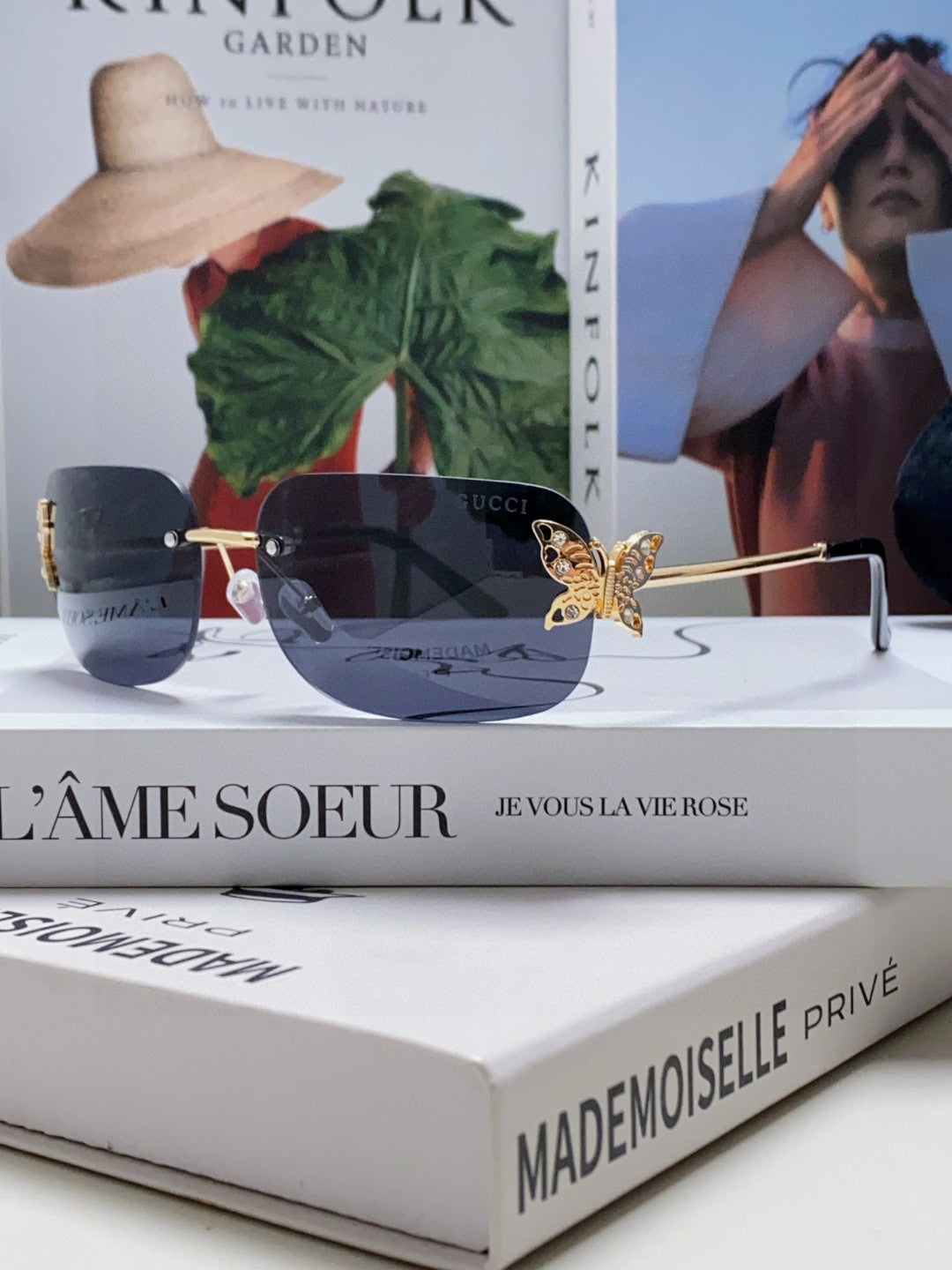 BUTTERFLY EMBELLISHED RIMLESS RECTANGULAR FRAME SUNGLASSES 570245 IN METAL