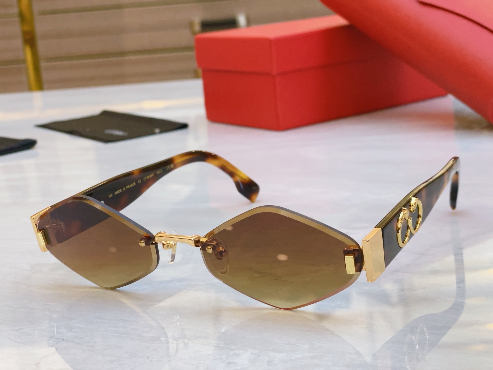 PANTHÈRE RHOMBUS FRAME SUNGLASSES CT00638S IN METAL AND ACETATE