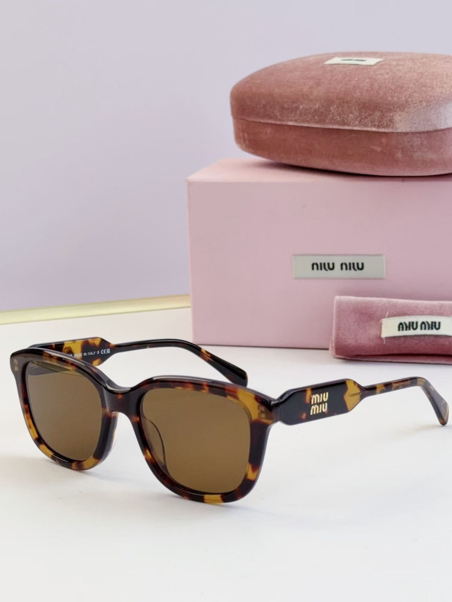 Miumiu Sunglasses MU 02ZV-F