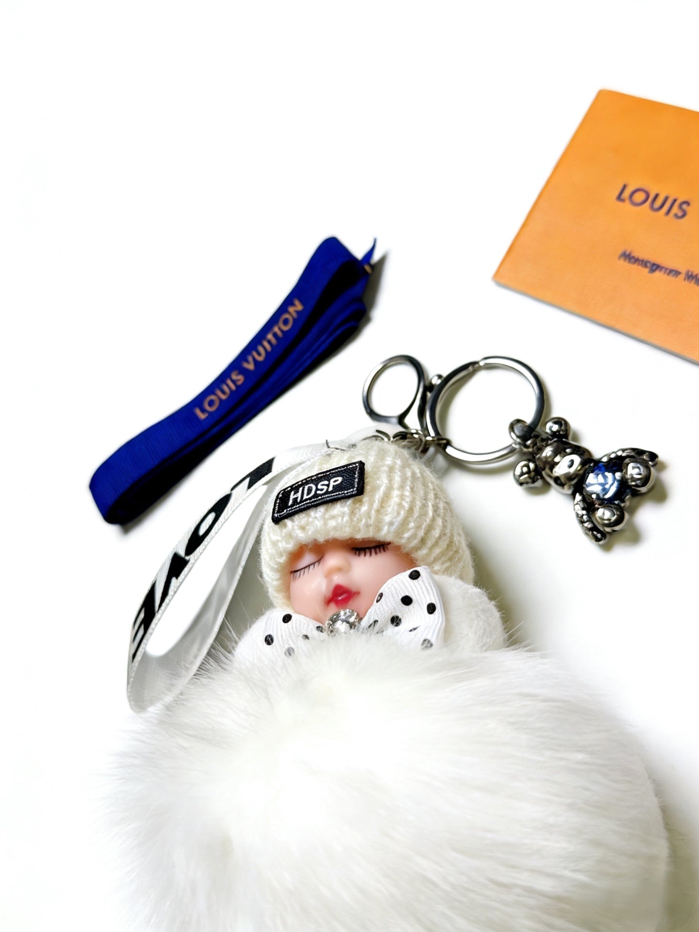 LV White Fluffy Plush Sleeping Baby Doll Charm